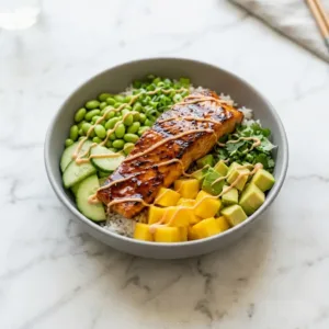 Grilled Salmon Bowls with Fresh Summer Flavor Grilled Salmon Bowls Grilled salmon bowl with jasmine rice, mango, avocado, cucumber, edamame, green onions, and fresh cilantro
